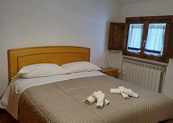 Фото Апартаменты Residenza Peralto - Affitti Brevi Italia Рокка-ди-Меццо